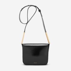 DeMellier London The Stockholm high gloss black leather